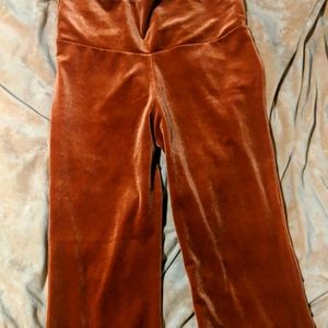 Orange velvet flare pants